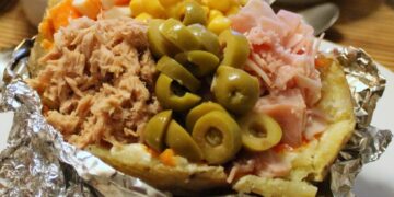 Alrededor de 10 personas intoxicadas en la Feria de Málaga tras comer patatas asadas