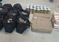 Intervenidos más de 800 kilogramos de hachís ocultos en latas de tomate en una nave industrial en Mollina